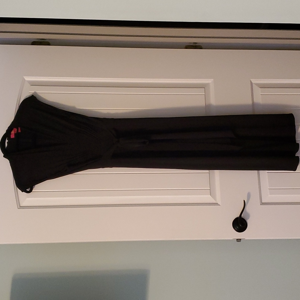 Black v neck jumpsuit.  Wide leg.  With pleat look.